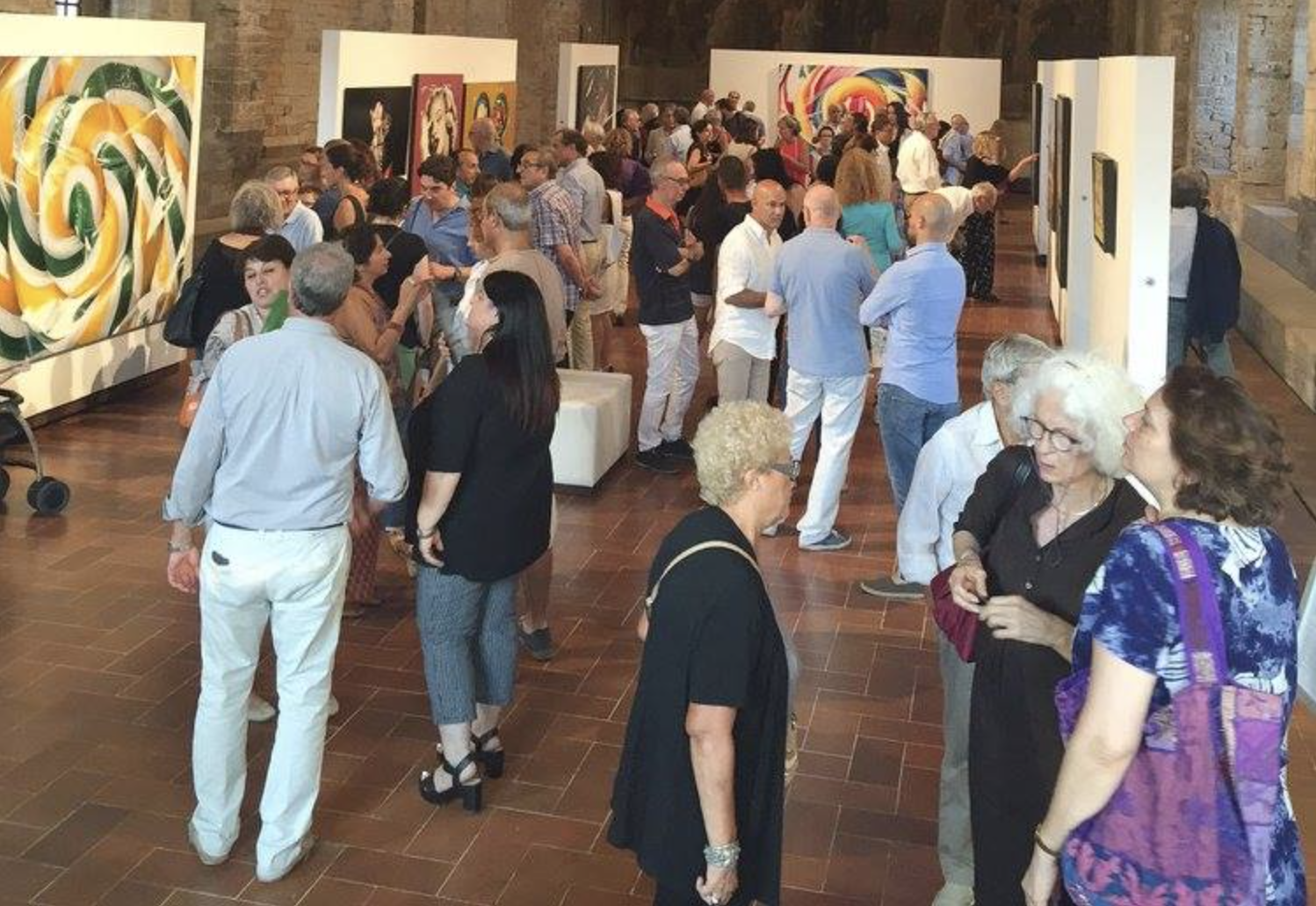 Crowd at an art exhibition in Todi